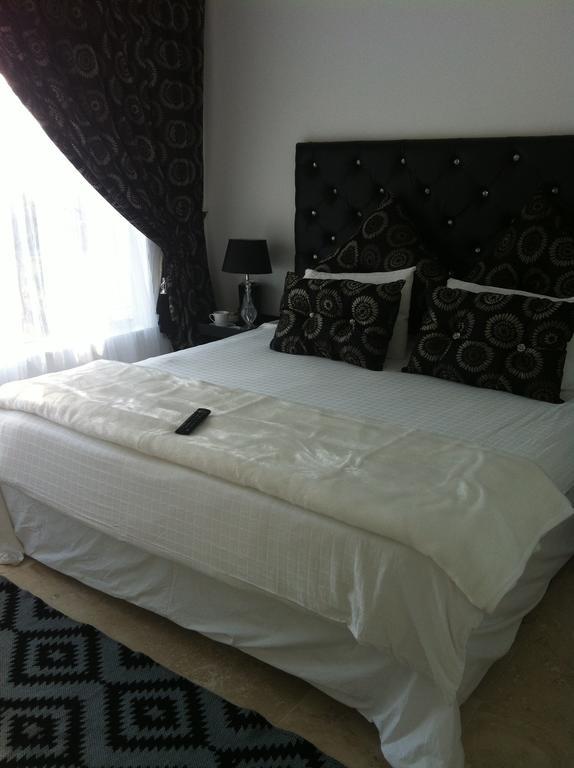 130 Market Bed And Breakfast โจฮันเนสเบิร์ก ห้อง รูปภาพ