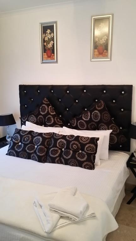 130 Market Bed And Breakfast โจฮันเนสเบิร์ก ห้อง รูปภาพ